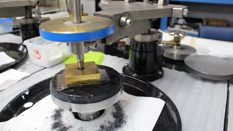 An image of Polishing and Grinding equipment. Polishing and Grinding services from Manasota Optics in Sarasota, FL.